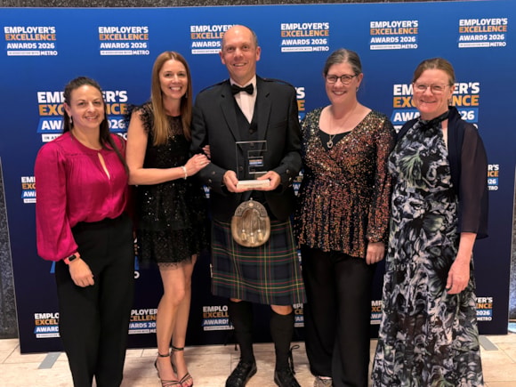 ScottishPower's Climate Change and Sustainability team collecting the CSR award at the awards ceremony (Credit: ScottishPower)